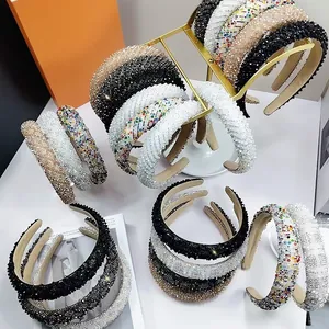 Detailed close-up of luxury crystal beaded headbands with sparkling rhinestones and gems