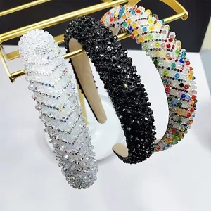Three-piece set of wide beaded sponge headbands with sparkling rhinestones on gold racks