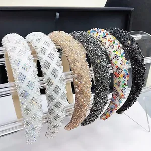 Detail shot of luxury padded headbands with sparkling crystal beads in various colors