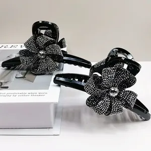 Pince à cheveux noire de 13cm avec strass brillants et design floral pour femmes