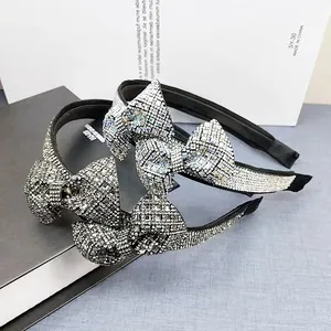 Elegant silver bow headband with full rhinestones in a vintage Korean style for women