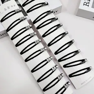 Lot d'élastiques à cheveux noirs avec perles et breloques M en strass sur cartes