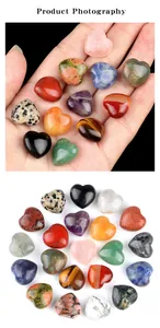 Macro detail of various polished heart-shaped natural crystal stones in multiple colors