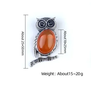 Vintage silver owl necklace with orange natural stone and black crystal eyes on branch