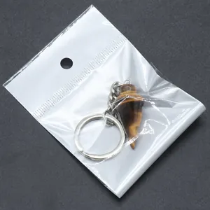 Kegelförmiger Schlüsselanhänger aus natürlichem Tigerauge mit silbernem Metallring