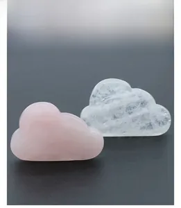 Detail of cloud-shaped rose quartz and clear crystal stones for facial massage