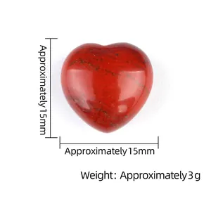 Polished natural red jasper heart stone 15mm gemstone ornament weighing 3g on white background