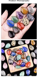 Detailed view of polished teardrop crystal pendants with pre-drilled holes for DIY jewelry