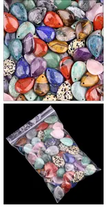 Mix of teardrop crystal pendants including tiger eye and rose quartz in PE bag packaging