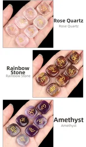 Detailed macro of polished amethyst and rose quartz stones with engraved golden symbols