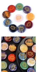 Macro view of natural crystal stones with golden lotus engravings for meditation and yoga
