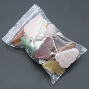 Assorted natural crystal cloud stones including rose quartz and white crystal set