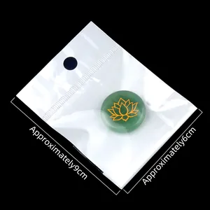 Green aventurine crystal stone with gold lotus engraving in 9x6cm packaging bag