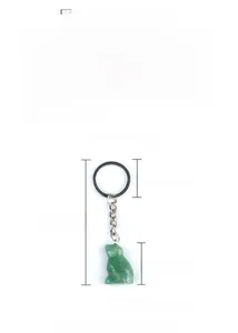 Macro detail of hand-carved green aventurine frog keychain with polished silver ring