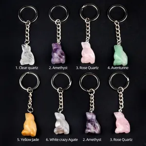 Hand-carved cat-shaped crystal and agate stone keychains in various gemstone styles