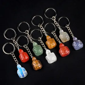 Handcrafted gemstone turtle keychains collection featuring diverse natural stones on black