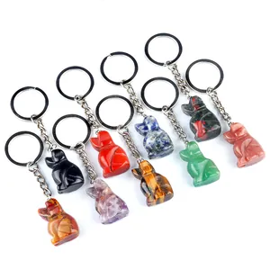 Natural crystal gemstone rabbit keychains in tiger eye, amethyst, and quartz varieties