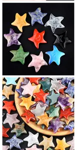 Detailed relief carvings of smiling faces on assorted natural crystal star-shaped stones