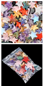 Macro detail of various natural crystal stars engraved with moon and star patterns