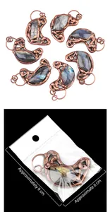 Macro detail of crescent labradorite pendants with copper plating and size dimensions