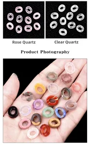 Close-up of polished natural quartz and crystal donuts for DIY jewelry making