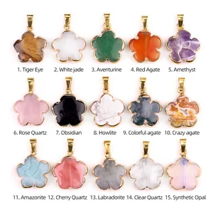 Variety of 20mm flower shaped natural gemstone pendants with gold plated edges and bails