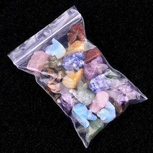 Mix di figurine di elefanti intagliate a mano in diverse pietre preziose e minerali