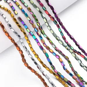 Detailed close-up of rainbow hematite cylinder beads for DIY jewelry making material