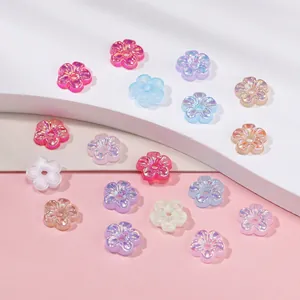 Macro view of colorful UV-plated acrylic flower spacer beads for DIY jewelry making