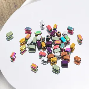 Macro shot of colorful faceted hematite loose beads with metallic plating for jewelry making