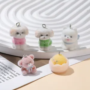 Close-up of cute flocked animal charms showing soft texture for DIY keychains
