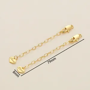 Detail of 18K gold plated heart-shaped extender chain with lobster clasp and Love pendant