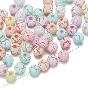 Macro detail of colorful 8-10mm acrylic crackle beads for DIY jewelry making and crafts