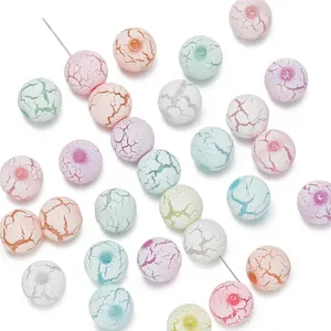 Macro detail of mixed macaron color crackle acrylic beads for DIY jewelry making