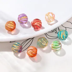 Colorful glass watermelon beads with golden spiral textures for DIY jewelry crafts