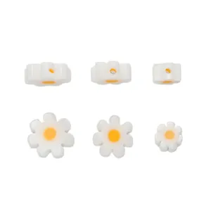 Handmade white daisy glass beads in three sizes with horizontal holes for DIY jewelry