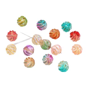 Colorful iridescent glass beads with spiral texture and gold accents for DIY jewelry