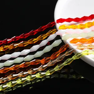 Macro shot of faceted diamond-shaped crystal glass beads for DIY jewelry making