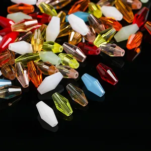 Detailed macro shot of multi-colored faceted bicone crystal beads for DIY jewelry making