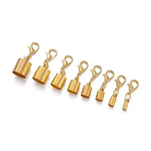 Detailed set of golden lobster clasps and end caps for jewelry making in various sizes