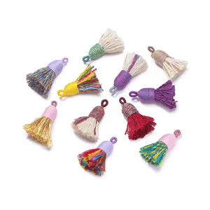 Detailed view of colorful handmade Tibetan cotton thread mini tassels for DIY accessories