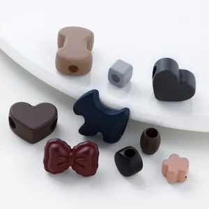 Macro view of matte multi-shape silicone beads for DIY handmade jewelry and accessory making