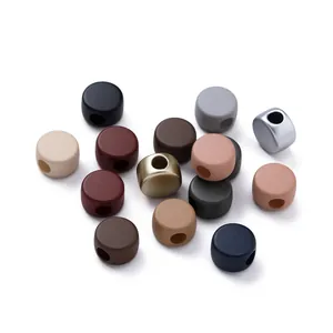 Macro shot of colorful matte and metallic acrylic beads for DIY jewelry and phone chains