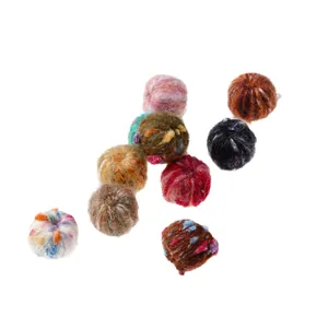 Colorful handmade wool felt balls for DIY jewelry and crafts on white background