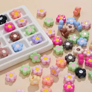 Mixed color acrylic flower beads for DIY jewelry making in a white sorting tray