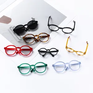 Set of colorful round frame doll glasses in black, tortoiseshell and green resin styles