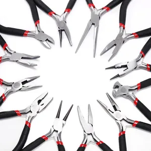 Top view of 12 professional jewelry pliers arranged in a symmetric circle for DIY crafts