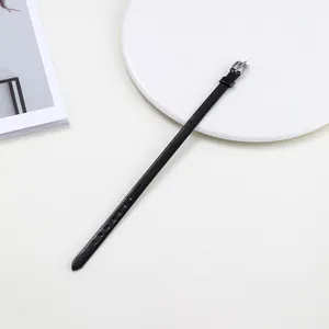 Slim black PU leather watch strap with lychee texture and silver metal buckle