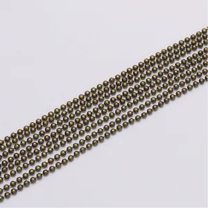 Detailed close-up of antique bronze ball chain links for DIY jewelry making and necklaces