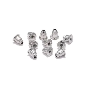 Silver bullet-shaped metal earring backs with silicone core stoppers set on white